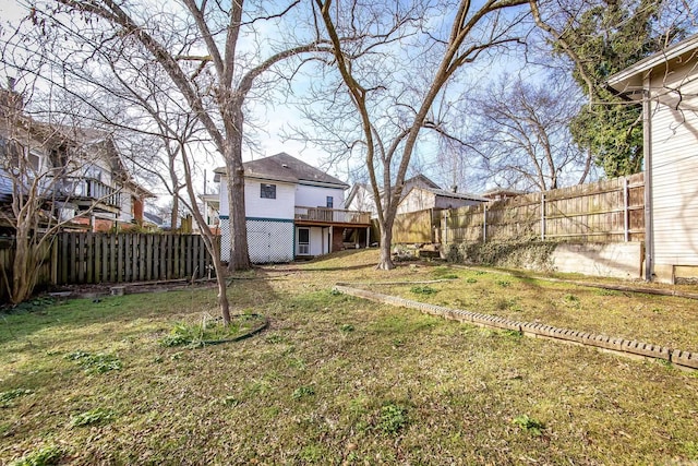 view of yard featuring a wooden deck