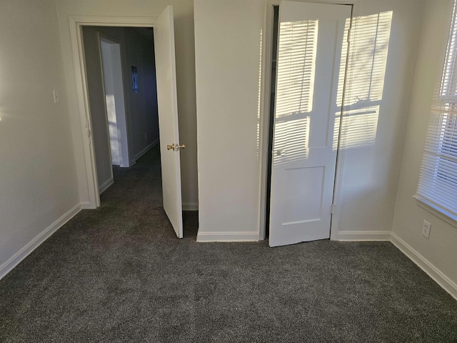 interior space with dark carpet