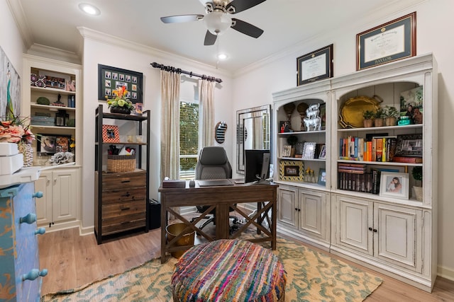 home office featuring ornamental molding, ceiling fan, and light hardwood / wood-style flooring