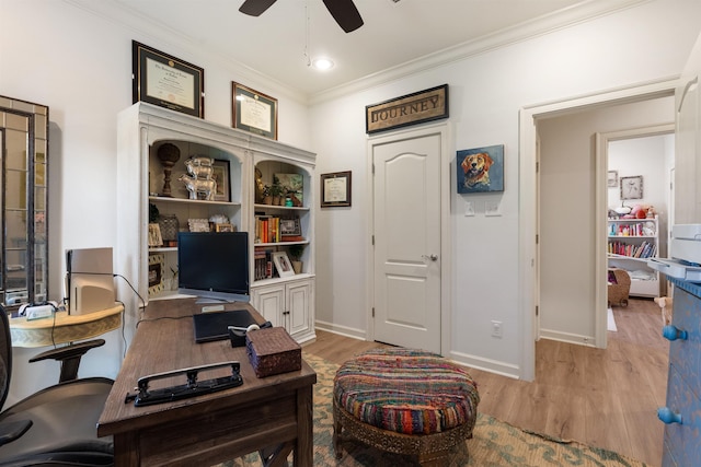 office area with crown molding, ceiling fan, and light hardwood / wood-style flooring