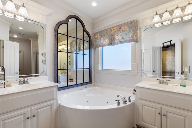 bathroom featuring crown molding, a tub to relax in, and vanity