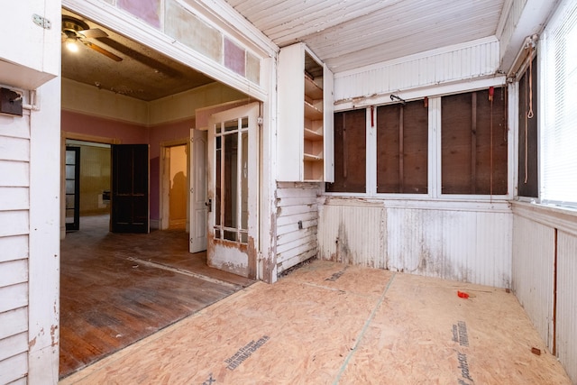 interior space featuring ceiling fan