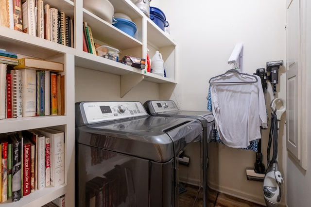 laundry room with washing machine and clothes dryer