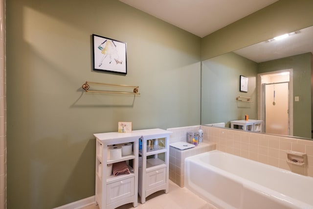 bathroom featuring a tub to relax in