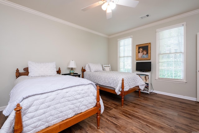 bedroom featuring crown molding, ceiling fan, and dark hardwood / wood-style floors