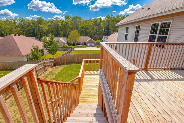 deck featuring a lawn