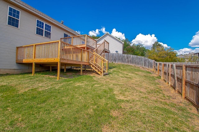 view of yard with a wooden deck