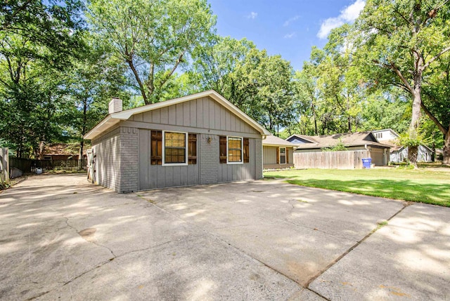 view of home's exterior featuring a lawn