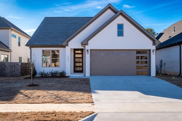 view of front of home with a garage