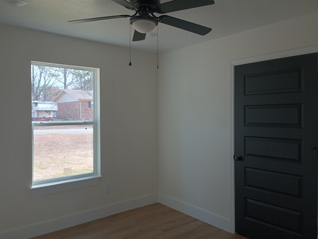 spare room featuring light hardwood / wood-style floors