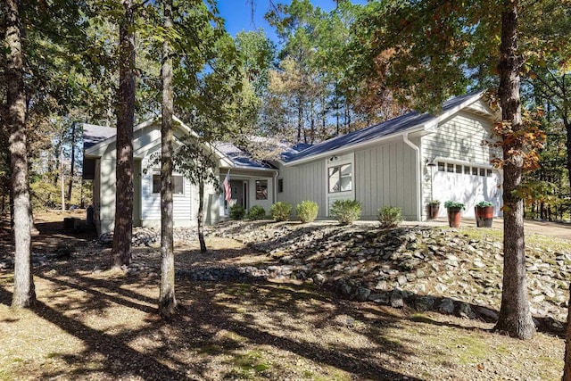 ranch-style house featuring a garage