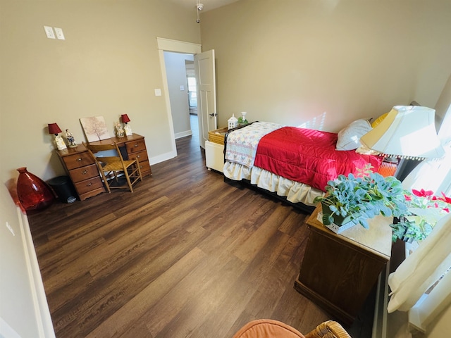 bedroom featuring dark hardwood / wood-style floors