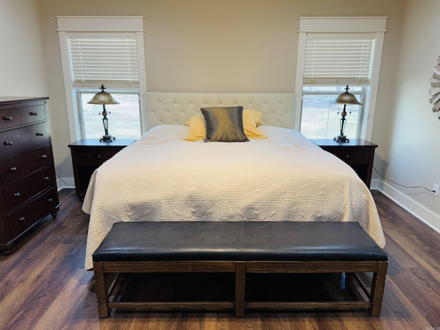 bedroom featuring dark hardwood / wood-style floors