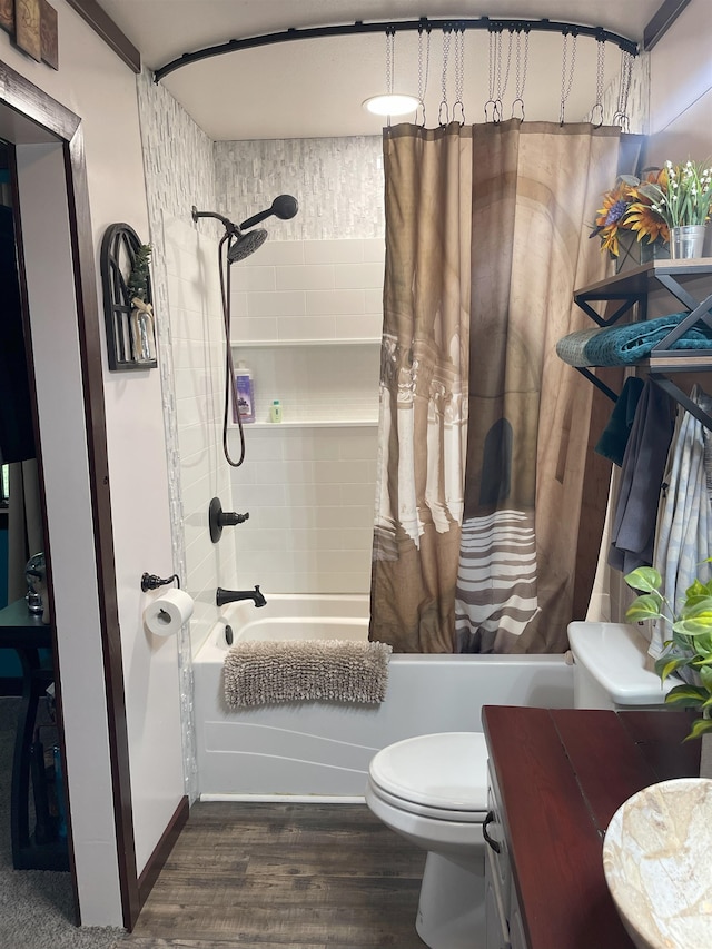 full bathroom with hardwood / wood-style flooring, vanity, toilet, and shower / bath combo