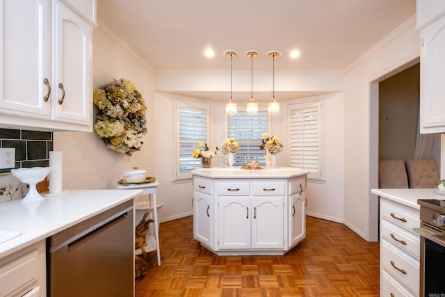 kitchen with decorative light fixtures, white cabinetry, crown molding, decorative backsplash, and light parquet flooring