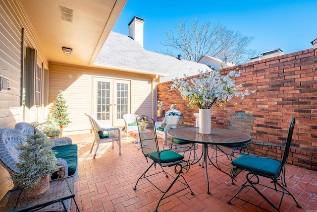 view of patio / terrace featuring french doors