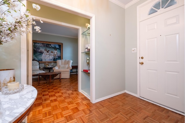 entryway with a notable chandelier, ornamental molding, and light parquet floors