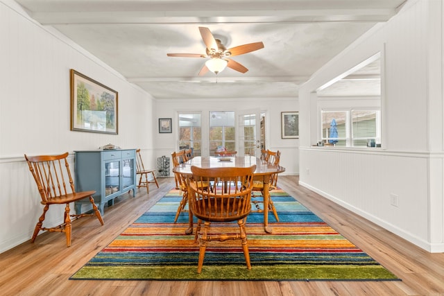 dining room with hardwood / wood-style floors and ceiling fan