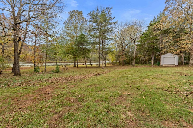 view of yard featuring a garage