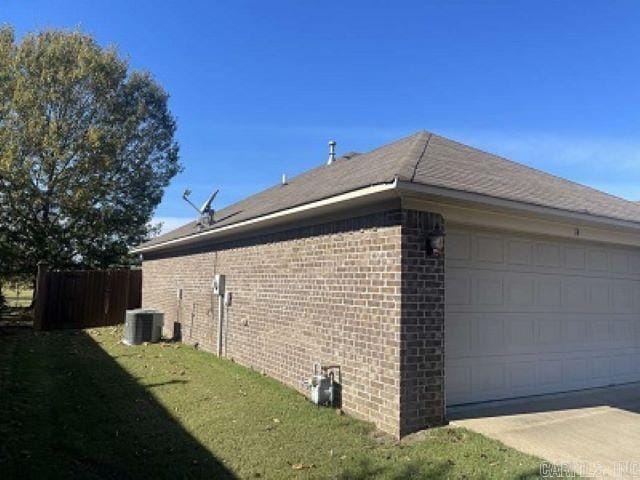 view of side of property with cooling unit