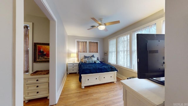 bedroom featuring ceiling fan and light hardwood / wood-style floors