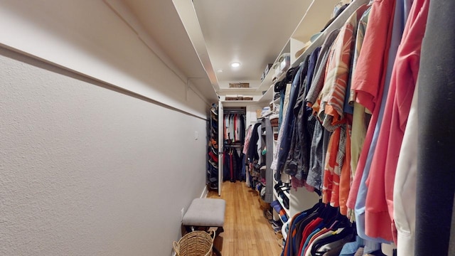 walk in closet featuring wood-type flooring