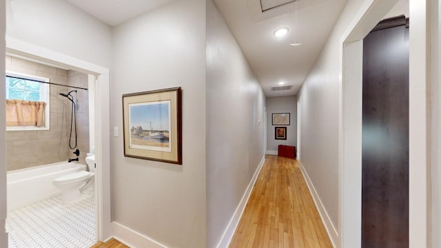 hallway featuring light wood-type flooring