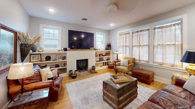 living room with light hardwood / wood-style flooring