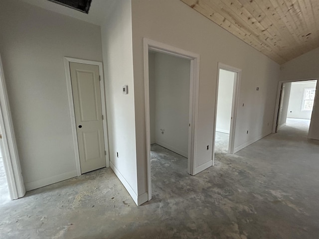 interior space featuring lofted ceiling and wood ceiling