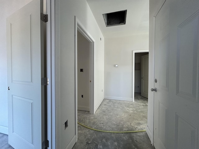 corridor with concrete floors