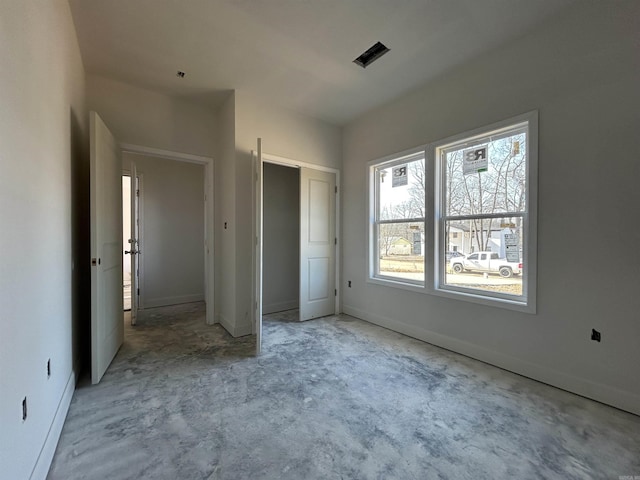 unfurnished bedroom featuring a closet