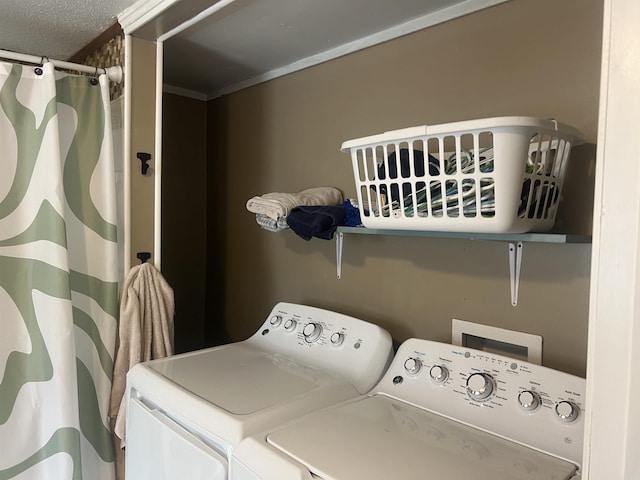 laundry area featuring washer and clothes dryer