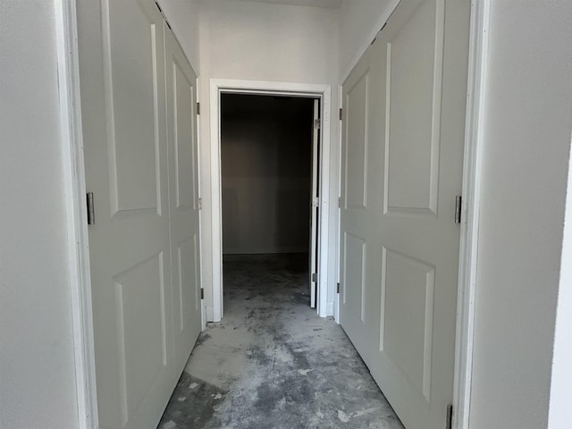 corridor featuring concrete floors