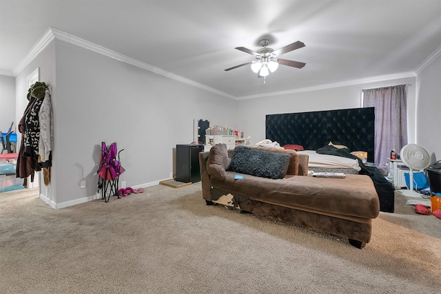 carpeted bedroom featuring crown molding and ceiling fan