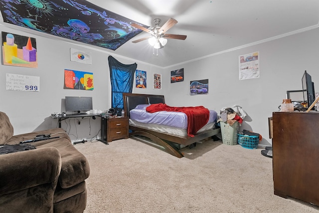 bedroom featuring ceiling fan, ornamental molding, and carpet