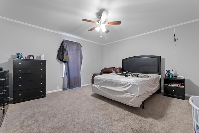 bedroom featuring ornamental molding, carpet, and ceiling fan