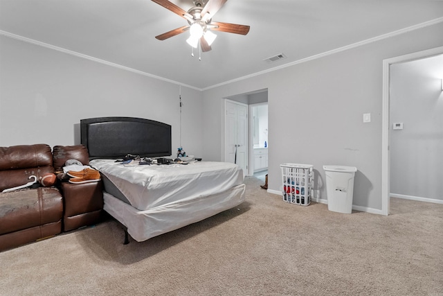 carpeted bedroom with crown molding, ceiling fan, and ensuite bathroom