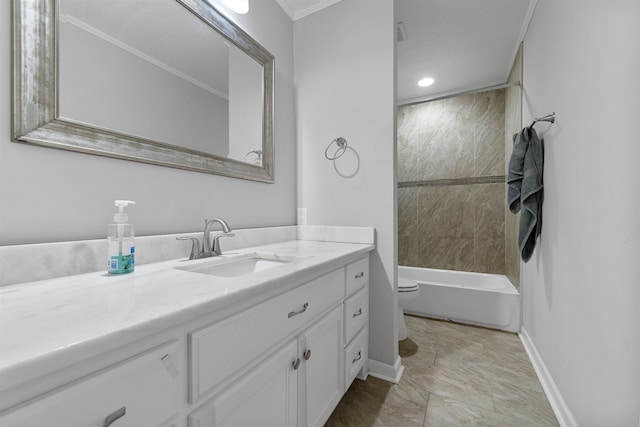 full bathroom with vanity, tiled shower / bath combo, and toilet