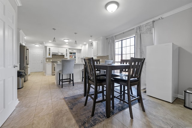 dining room with ornamental molding