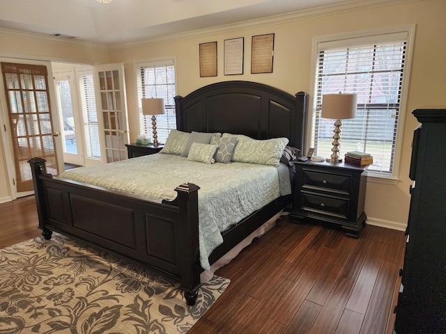 bedroom with multiple windows, crown molding, and dark hardwood / wood-style floors