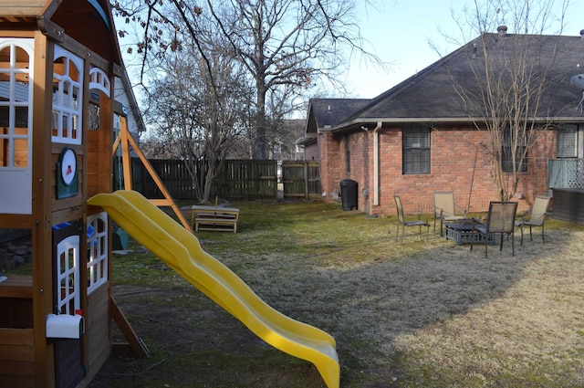 view of play area featuring a fire pit