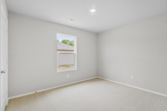 29 Doe Run Dr, Ward, AR 72176 - empty room featuring recessed lighting, baseboards, visible vents, and light colored carpet