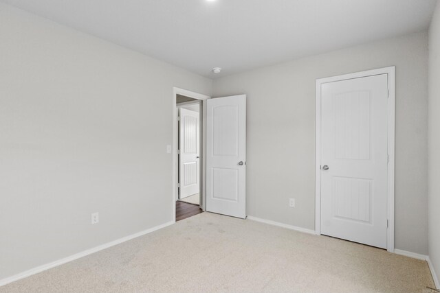 29 Doe Run Dr, Ward, AR 72176 - unfurnished bedroom with carpet floors and baseboards