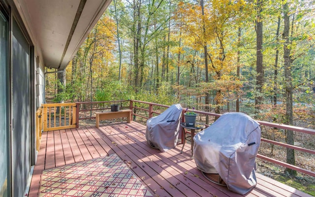 wooden deck featuring grilling area