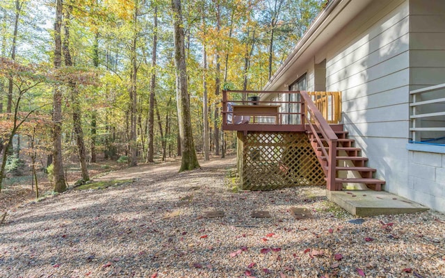 view of yard featuring a wooden deck