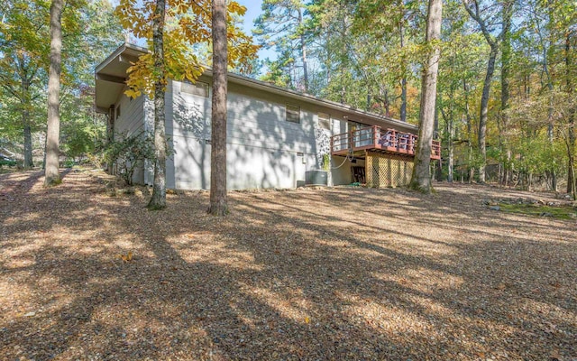 view of home's exterior with a deck