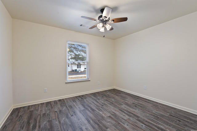 unfurnished room featuring dark hardwood / wood-style flooring and ceiling fan