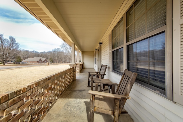 view of patio / terrace featuring covered porch