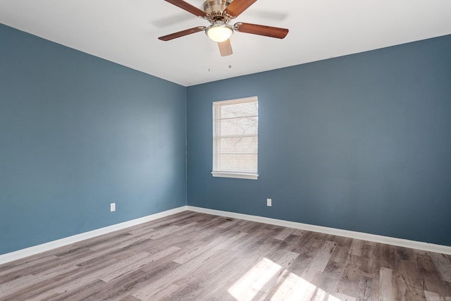 unfurnished room featuring ceiling fan and light hardwood / wood-style flooring