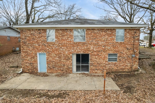 rear view of house with a patio